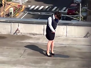 Classy asian pees on roof
